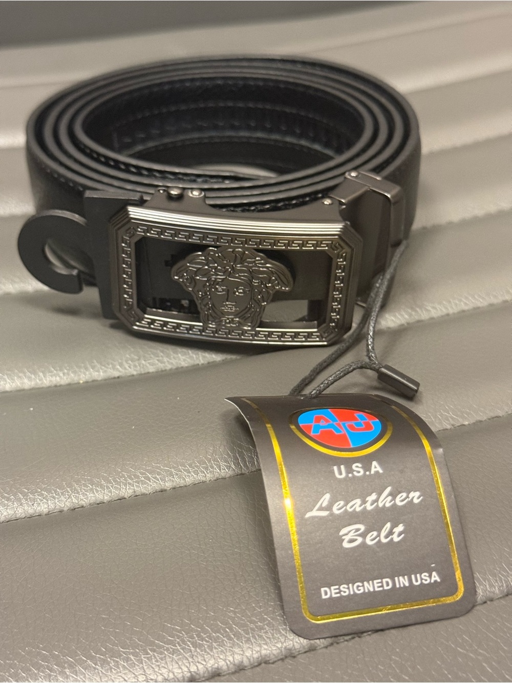 Black Leather Belt with Medusa-Style Buckle
Size 42-44( easy to cut small size)